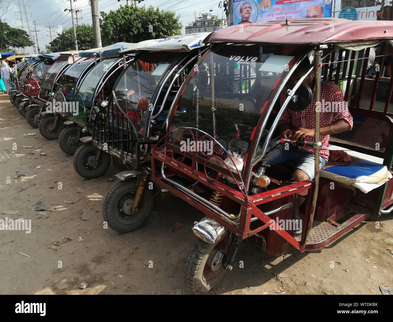 Dhaka, Bangladesh. 11th Sep, 2019. Charger auto rickshaws are seen on a ...
