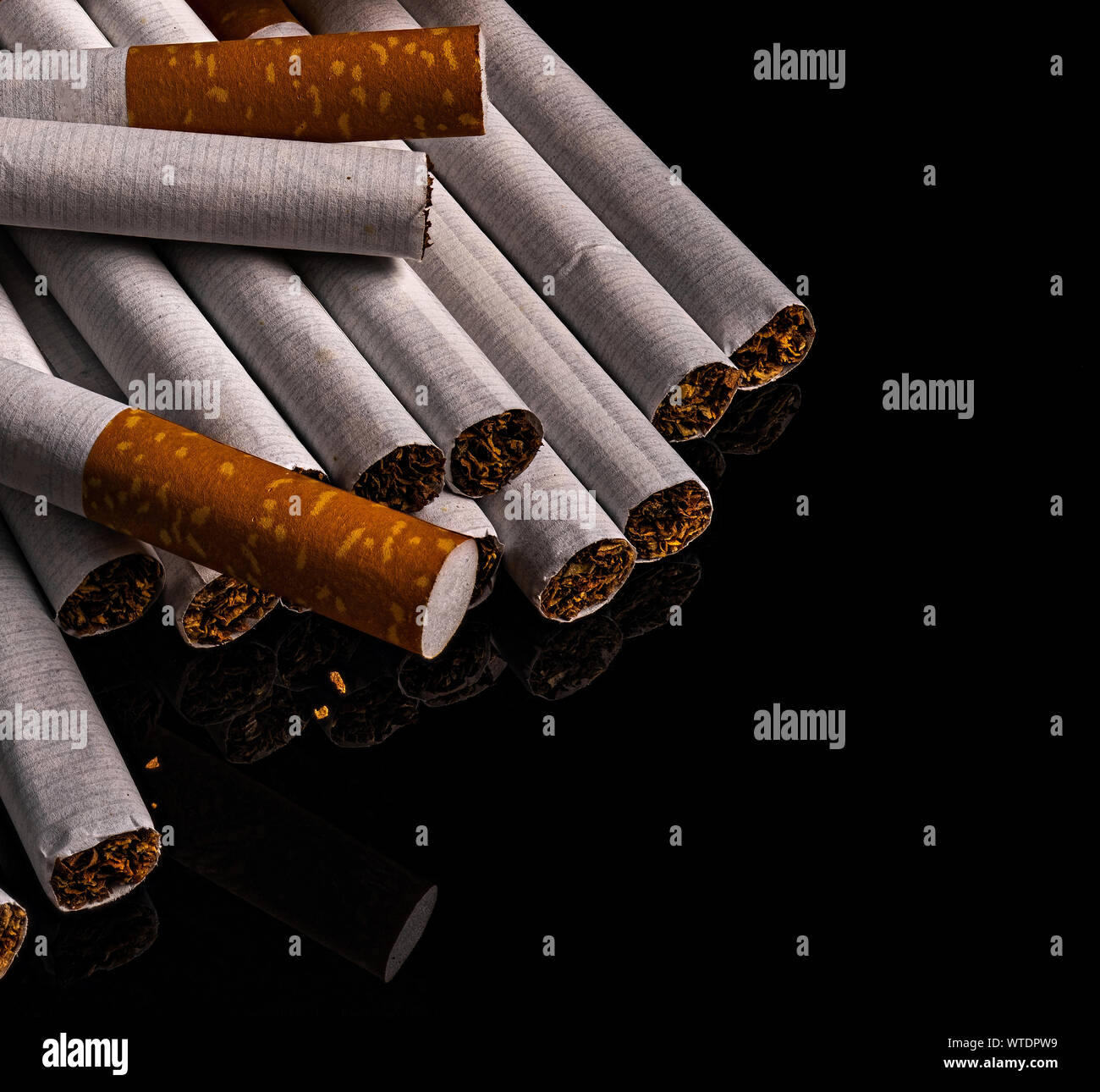 filter cigarettes of detail on black background Stock Photo Alamy