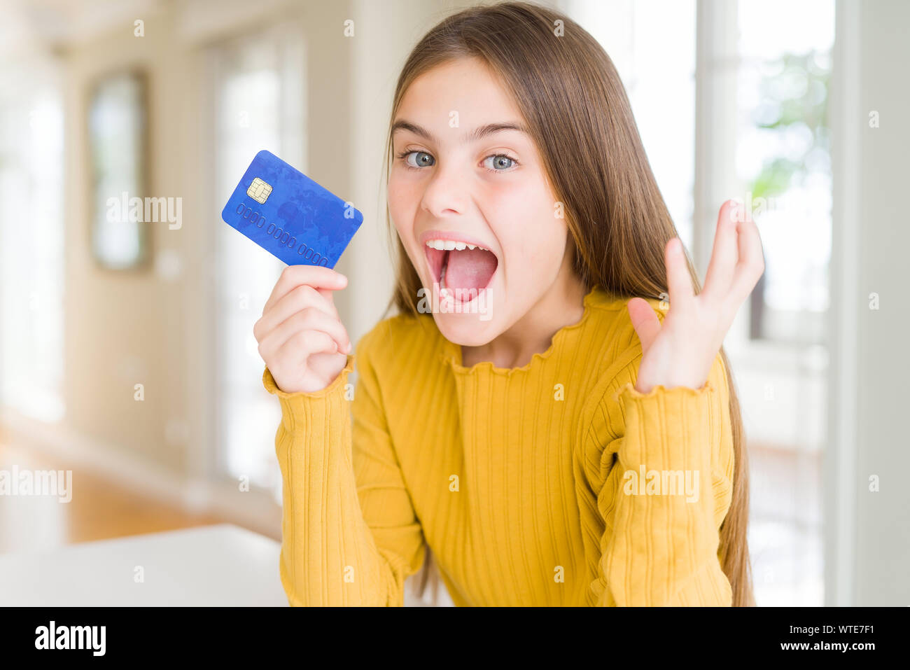 Beautiful Young Girl Kid Holding Credit Card Very Happy And Excited Winner Expression Celebrating Victory Screaming With Big Smile And Raised Hands Stock Photo Alamy Beautiful Young Girl Kid Holding Credit Card Very Happy And Excited Winner Expression Celebrating Victory Screaming With Big Smile And Raised Hands Stock Photo Alamy