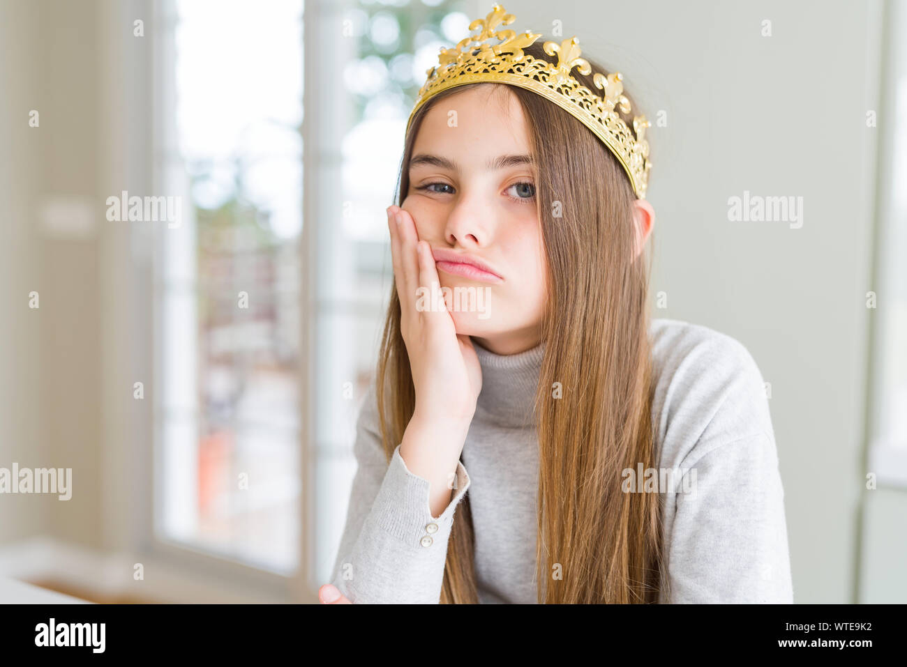 Beautiful Young Girl Wearing A Golden Crown As A Princess From