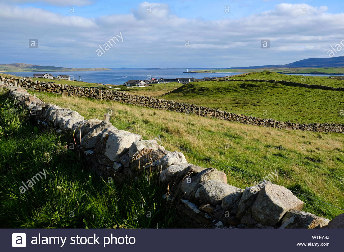 Outertown Road with a view towards Stromness Orkney, Scotland Stock Photo