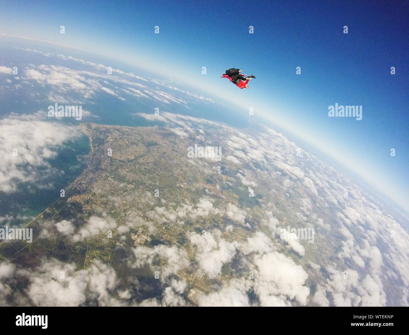 Aerial View Of People Skydiving Stock Photo