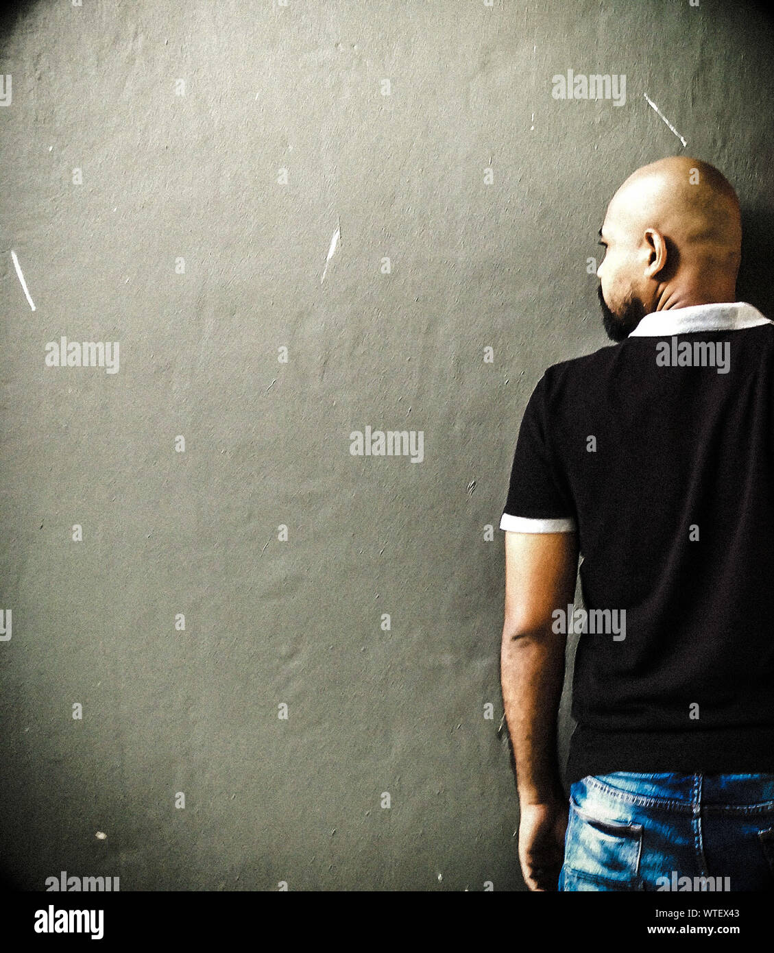 Man with shaved head hi-res stock photography and images - Alamy