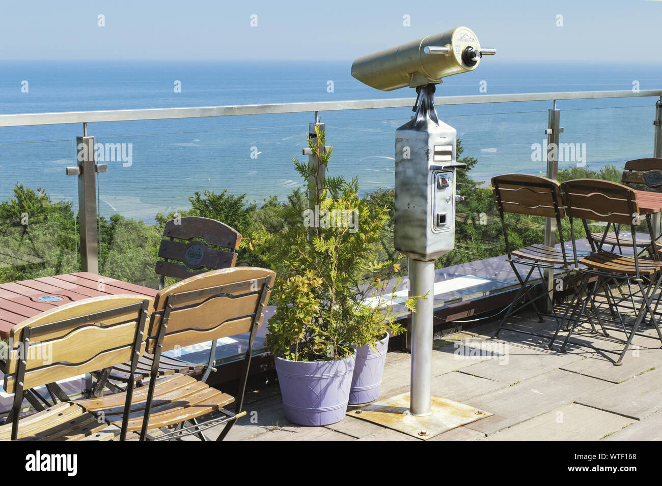 Rooftop cafe 'Widokowka' with open terrace and a tower viewer overlooking the Baltic sea, in Kolobrzeg, Poland. Stock Photo