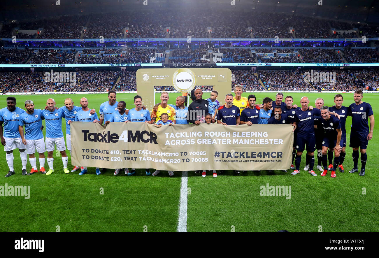 Manchester City Legend's and Premier League All Stars XI players hold up a  banner for the Tackle4MCR campaign prior to the beginning of the Vincent  Kompany Testimonial at the Etihad Stadium, Manchester