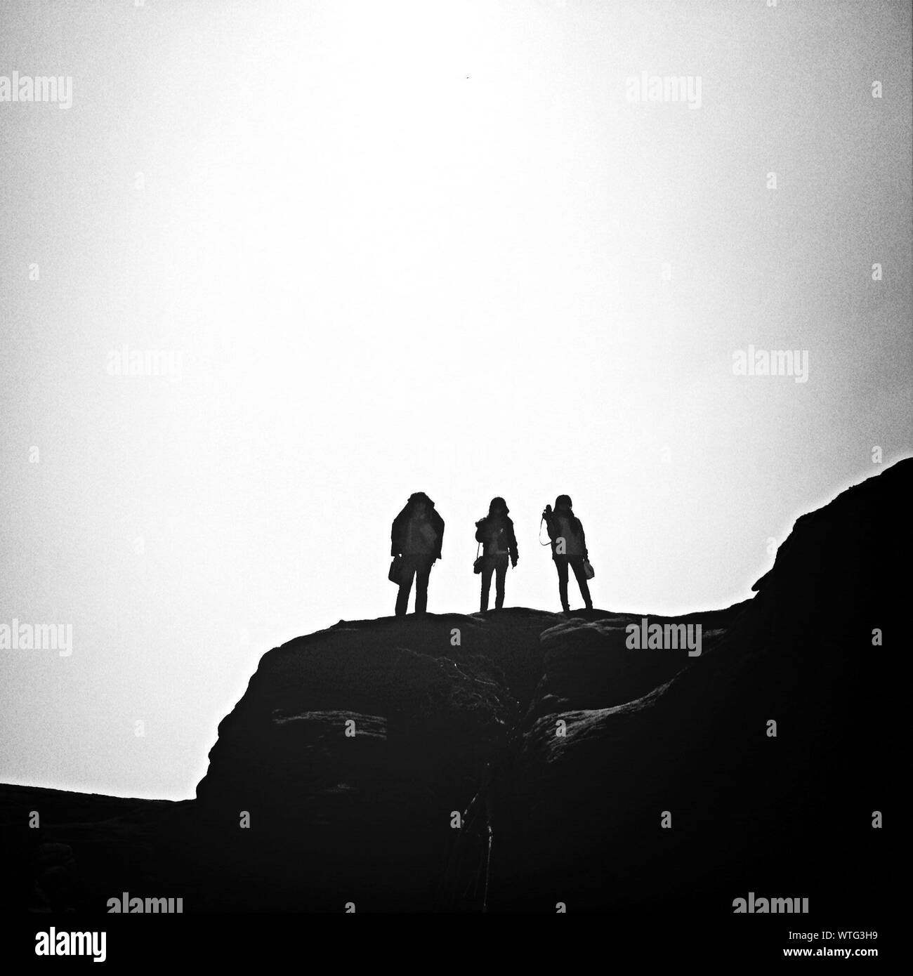 Three women silhouette rear hi-res stock photography and images - Alamy
