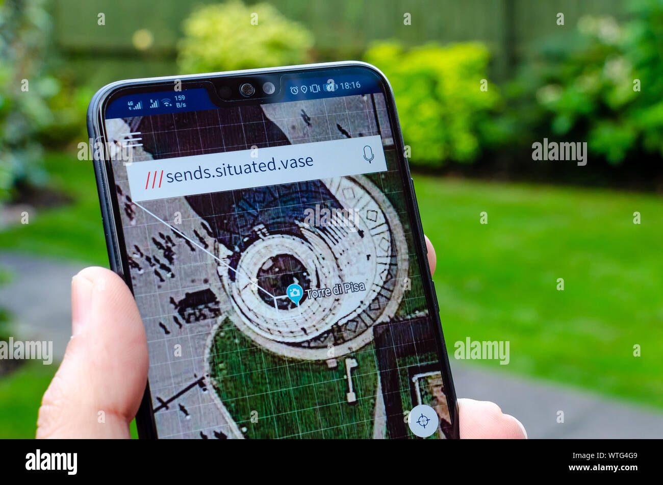 Three Word Grid Reference What3Words App On The Screen, Showing As An Example The "Three Word"  Coordinates For Famous Landmark The Leaning Tower Of Pisa In Italy Stock  Photo - Alamy