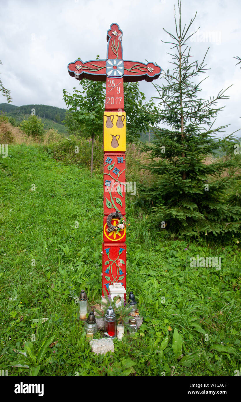 Wooden decorated cross in Tatra region, Slovakia Stock Photo