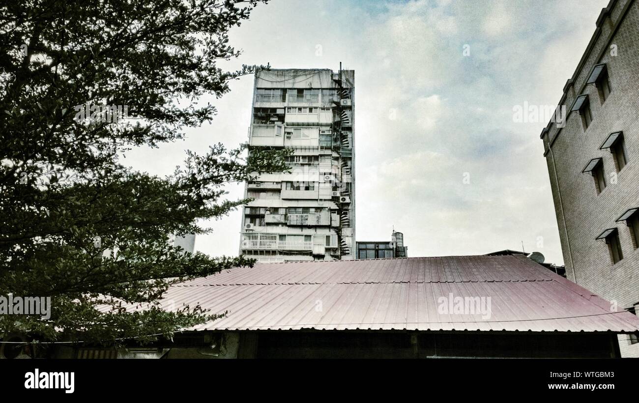 Roof With Apartment Building On Background Stock Photo - Alamy