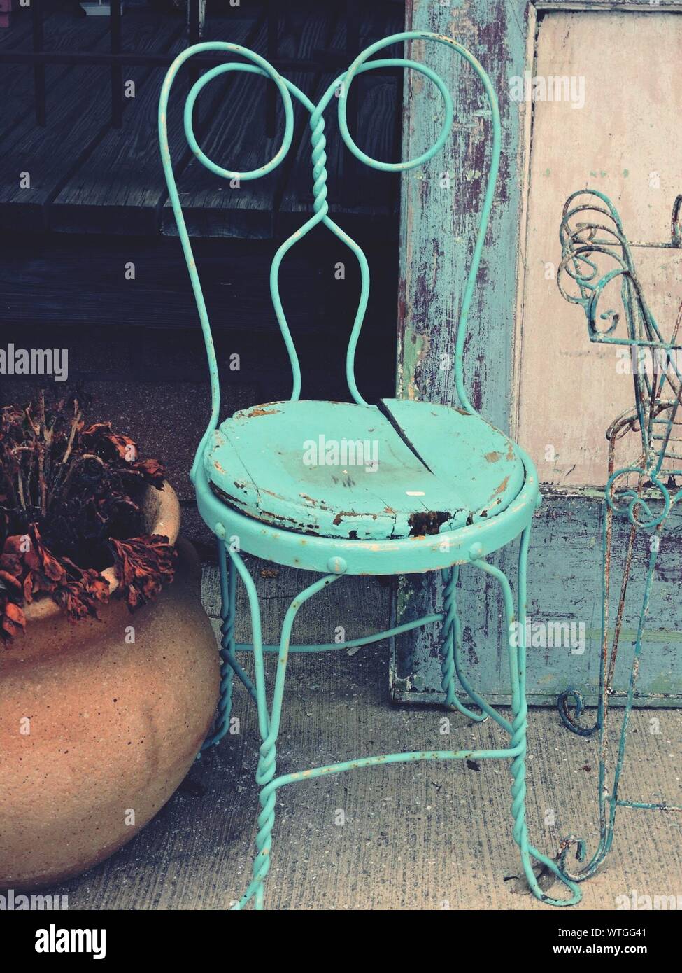 Old Broken Chair Abandoned In Backyard Stock Photo Alamy