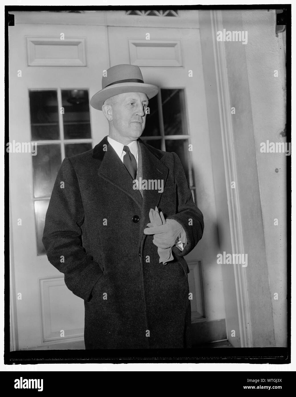 Missouri's Governor at White House. Washington, D.C., April 13. Missouri's Governor Lloyd C. Stark leaving the White House today after conferring for twenty minutes with President Roosevelt. While he did not say so, Governor Stark is believed to have thanked the President for Aid in his fight against boss Tom Pendergast of Kansas City, 4-13-39 Stock Photo