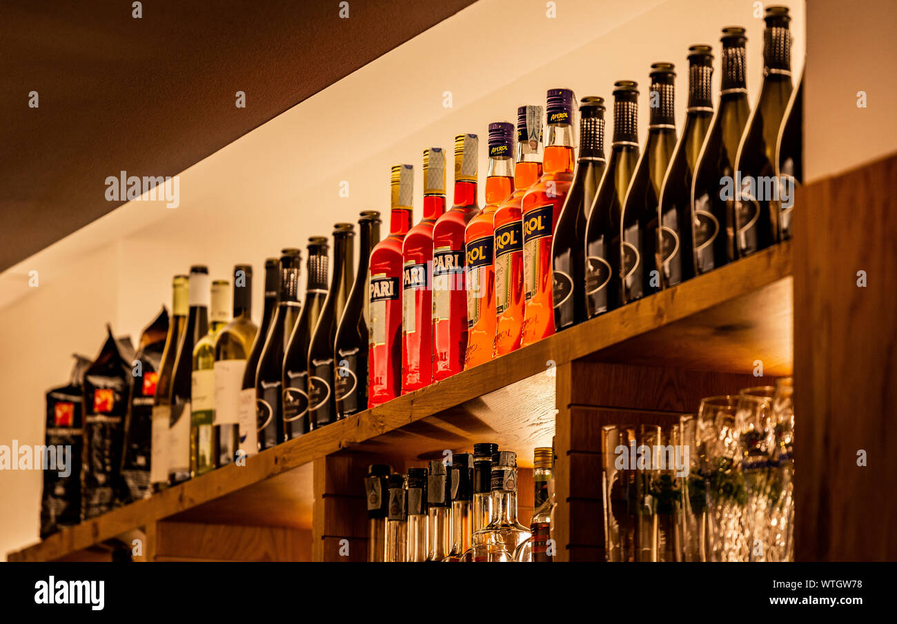 Bottles of alcohol on the shelf Stock Photo Alamy