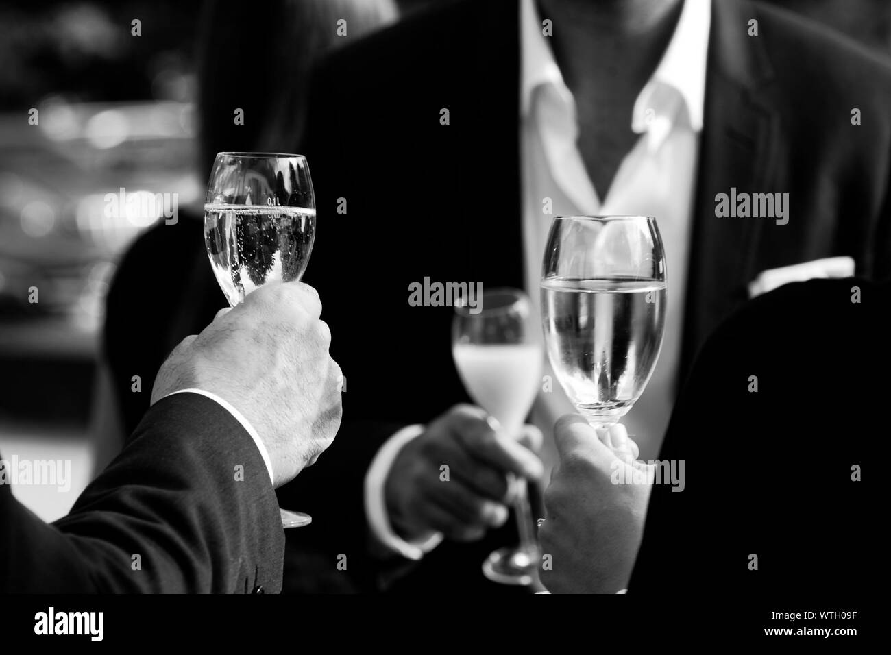 Midsection Of Business People Raising Toast Stock Photo Alamy