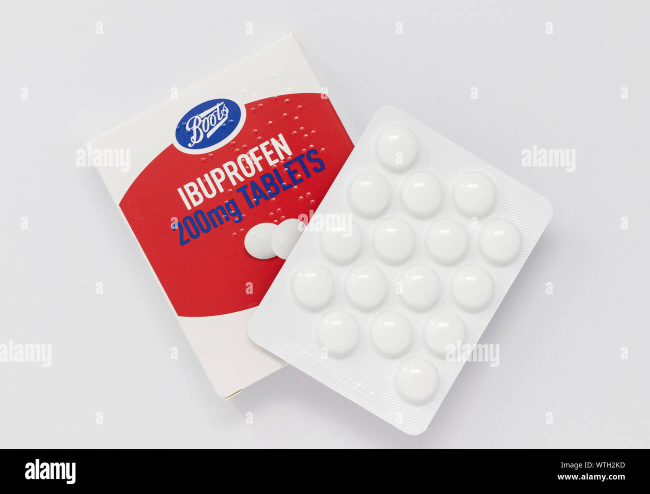London / UK - September 7th 2019 - Packet of Ibuprofen painkillers, closeup with blister pack of tablets from Boots pharmacy Stock Photo