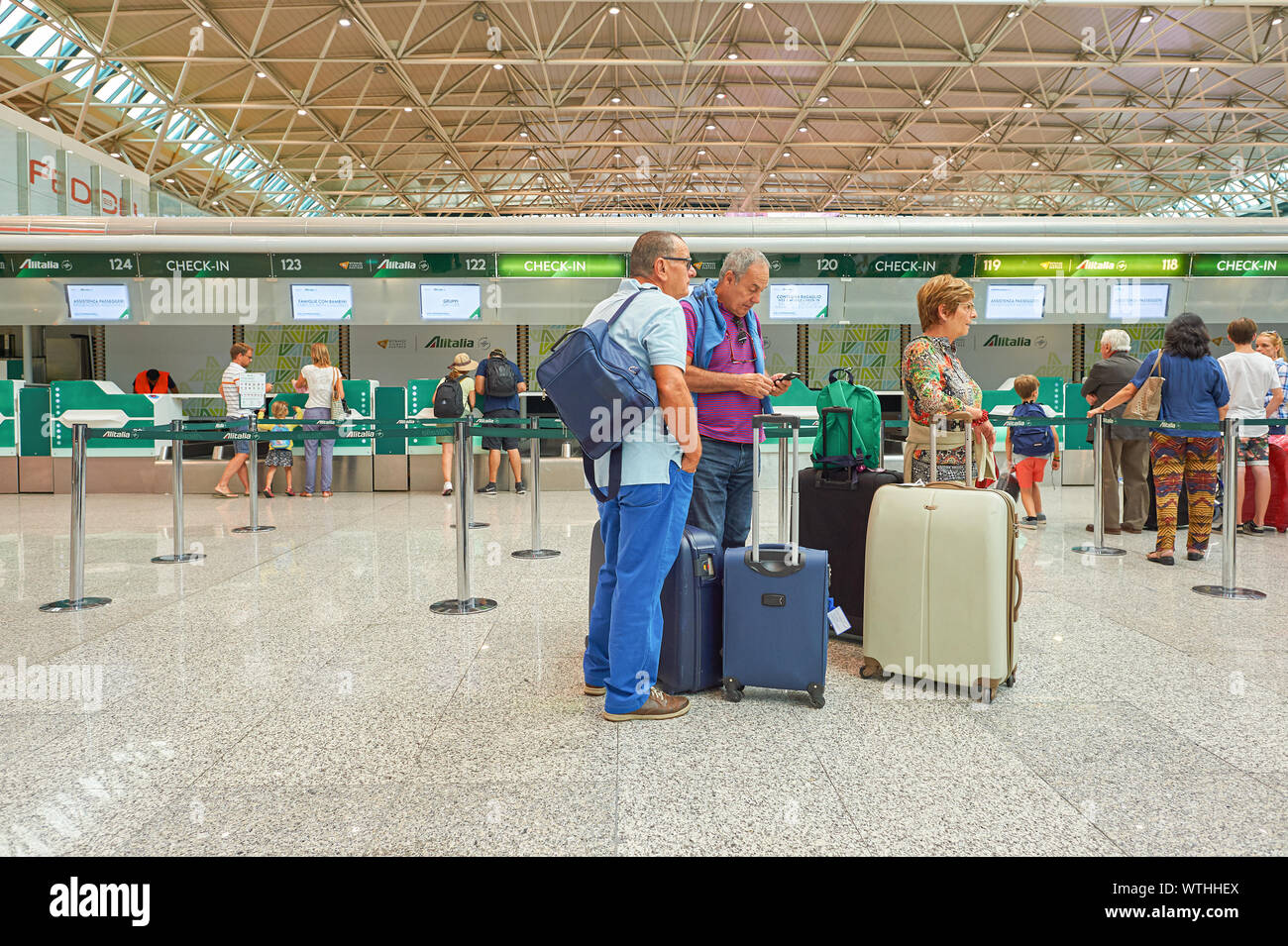 ROME, ITALY - CIRCA AUGUST, 2015: people at check-in area in Rome - Fiumicino International Airport 'Leonardo da Vinci'. Stock Photo