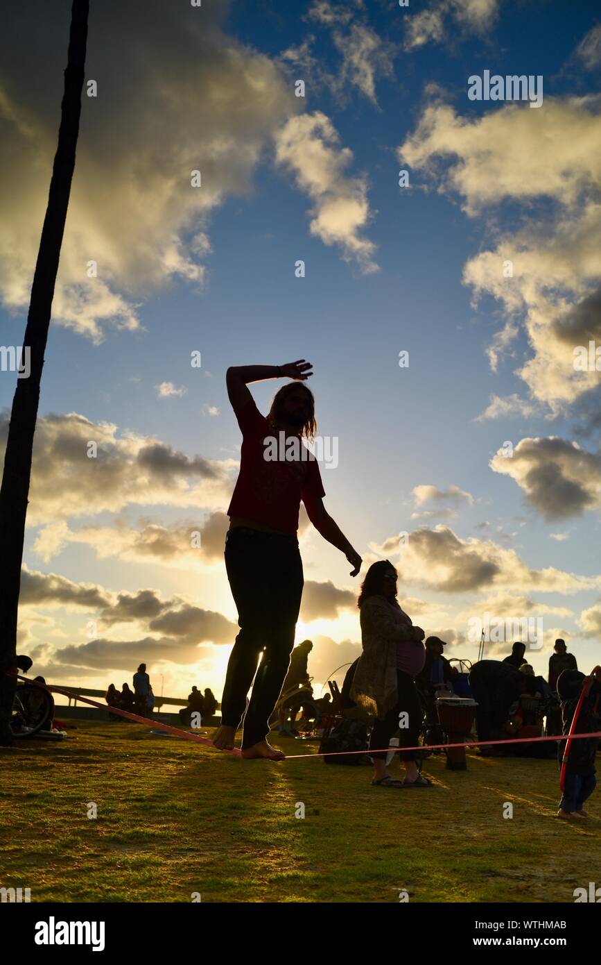 Hippy Rope Flow Tight rope practice in park, with bohemian, hippie, unconventional ...