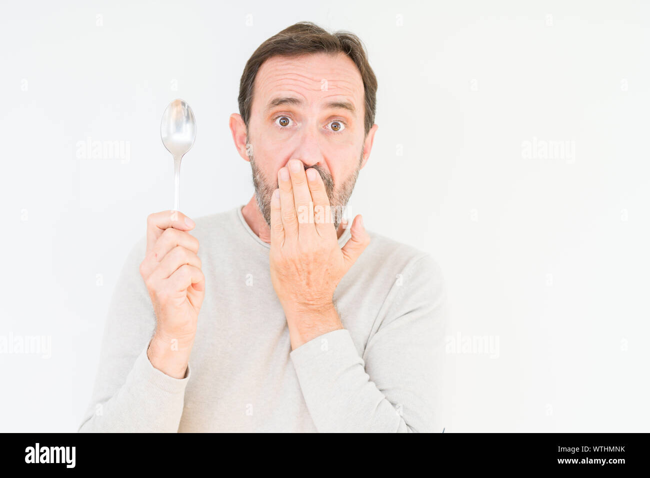 Silver spoon mouth hires stock photography and images Alamy
