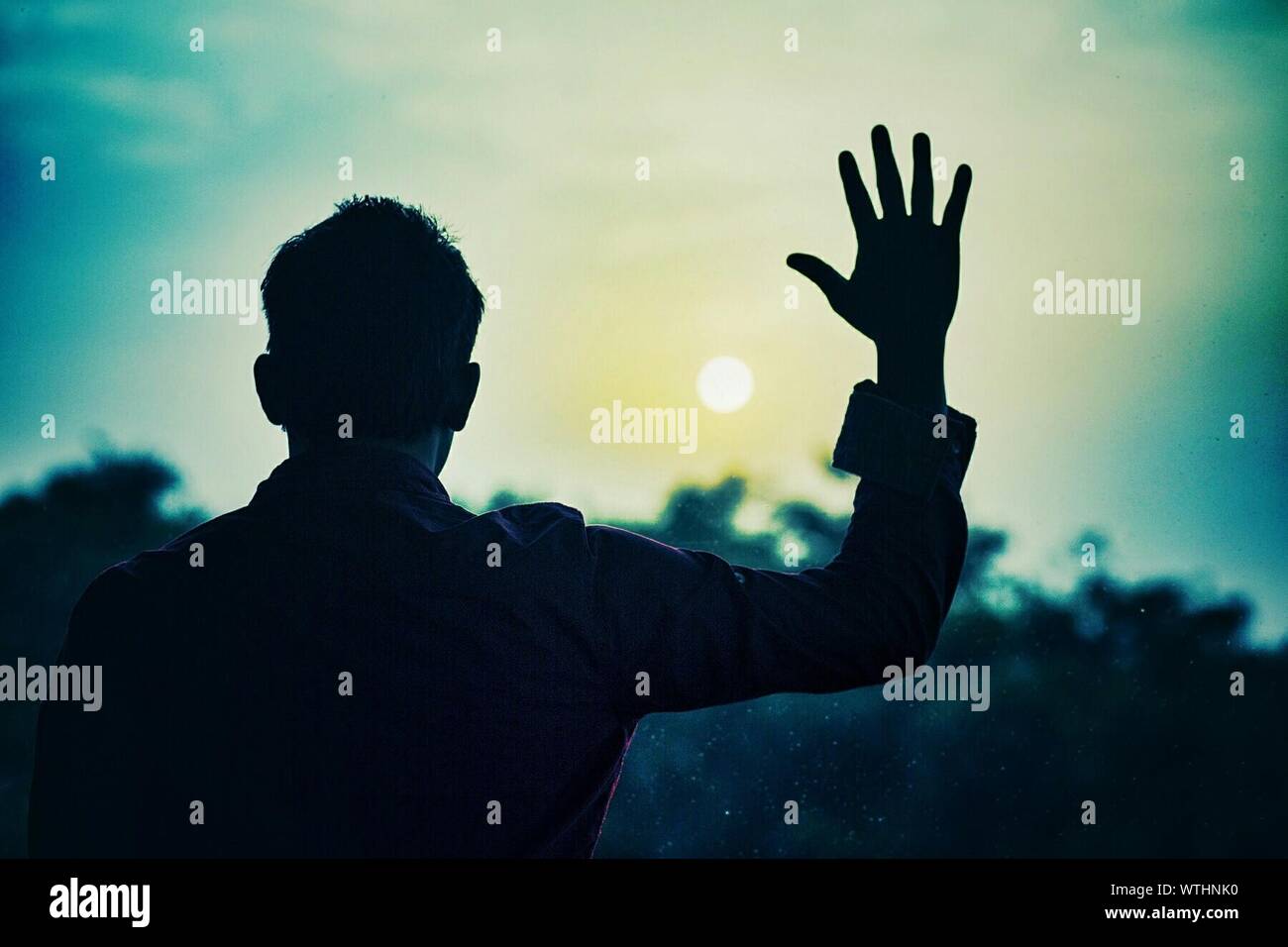 Raising arms to the sky hi-res stock photography and images - Alamy