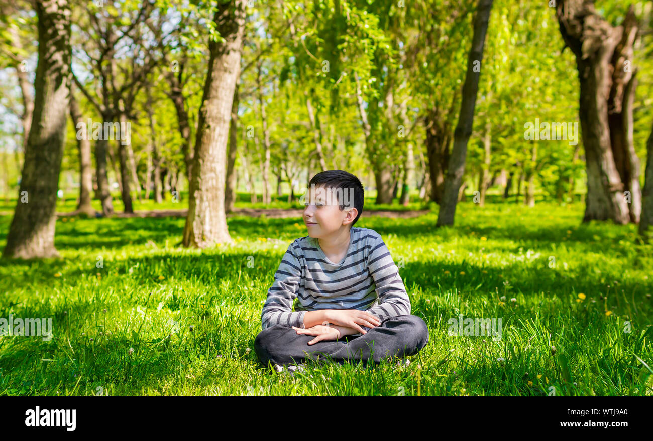 Boy Day Dreaming Outdoors Stock Photo