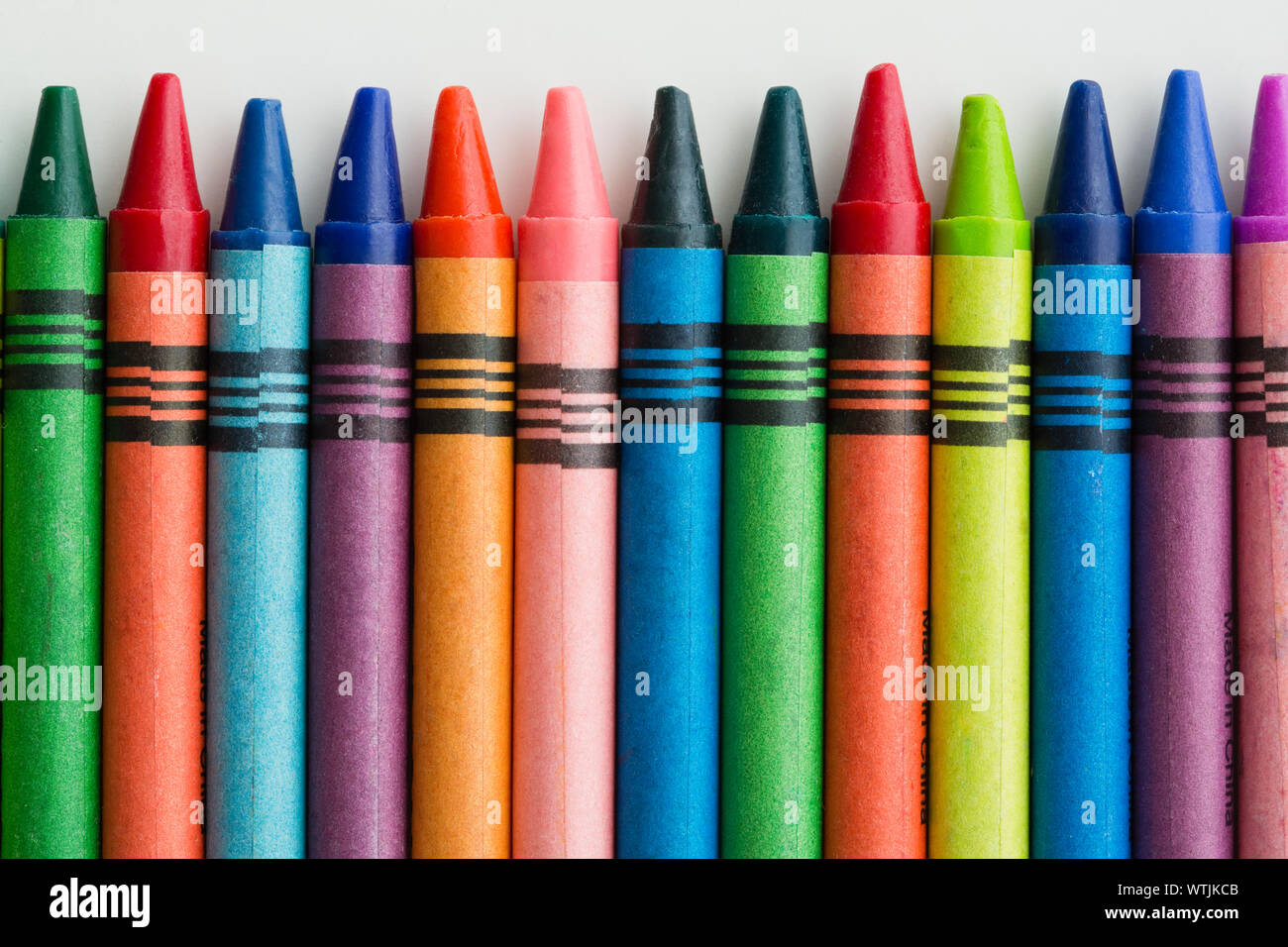 Colored crayons in a row Stock Photo Alamy
