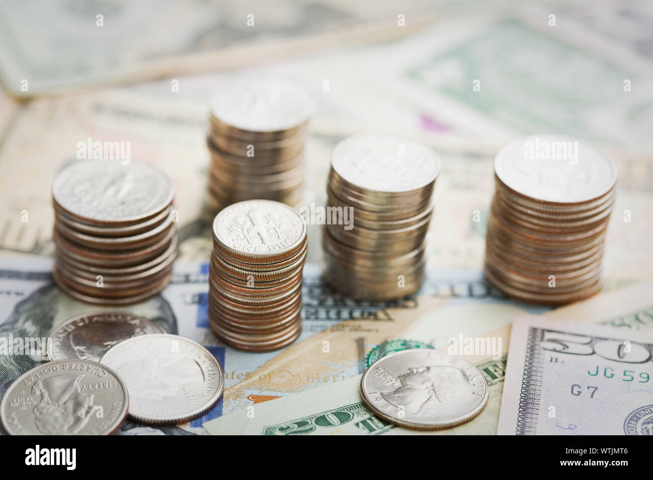 Close up of US coins and paper currency Stock Photo