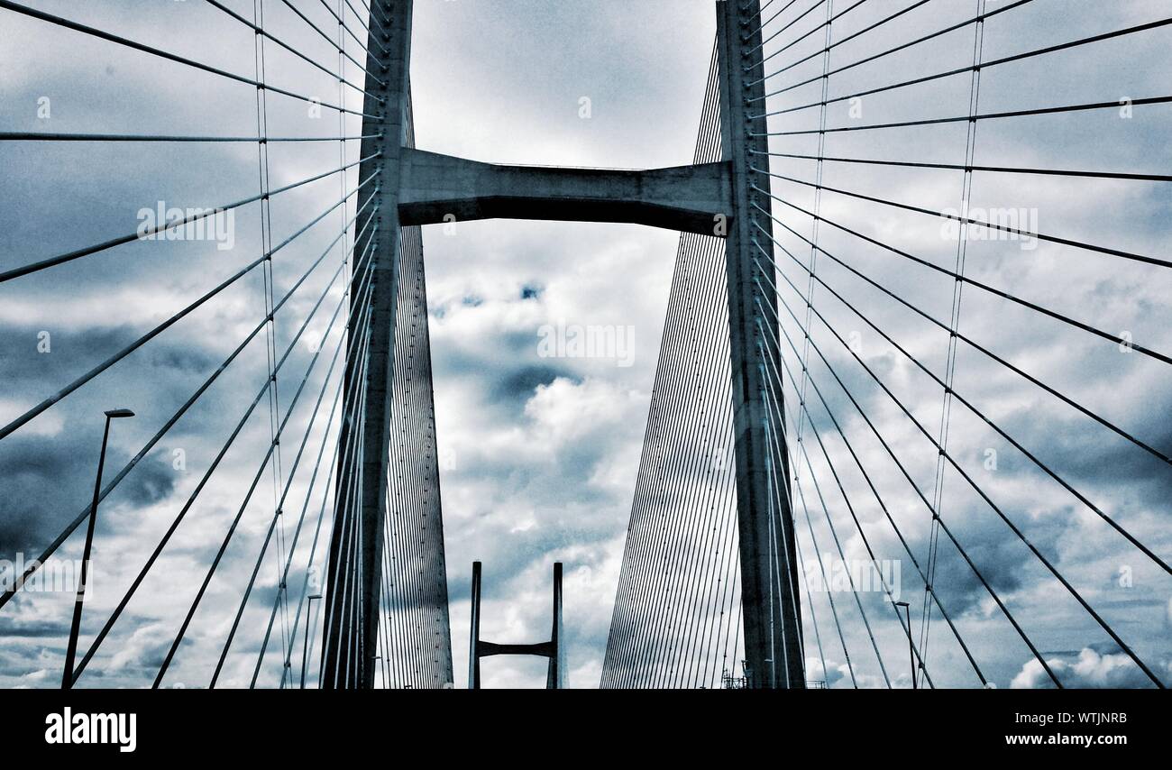Low Angle View Of Severn Bridge Against Cloudy Sky Stock Photo