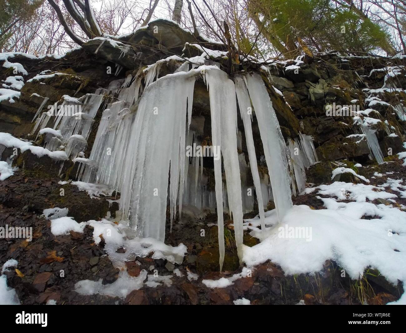 Low Angle View Of Icicles Hanging From Rock Stock Photo Alamy Low Angle View Of Icicles Hanging From Rock Stock Photo Alamy