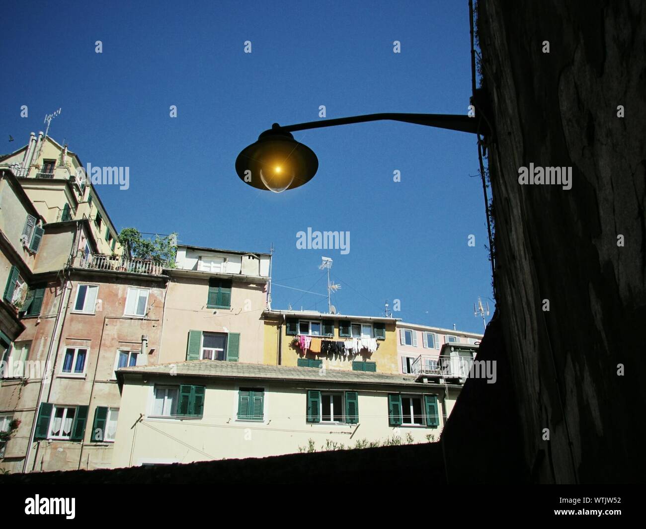 Building Exteriors And Street Lighting Lamp Stock Photo