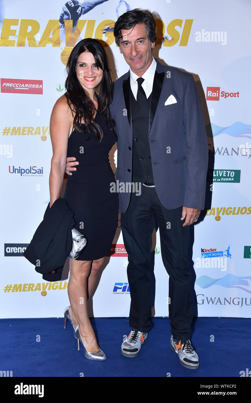 Rome, Italy. 12th Sep, 2019. Gala 'Meravigliosi' fifth edition organized by the Italian swimming federation to celebrate the blue trinfios in the last swimming world championships. Rome (Italy) 11 September, 2019 In the photo Stefano Pantano and wife Photo Fotografo01 Credit: Independent Photo Agency/Alamy Live News Stock Photo