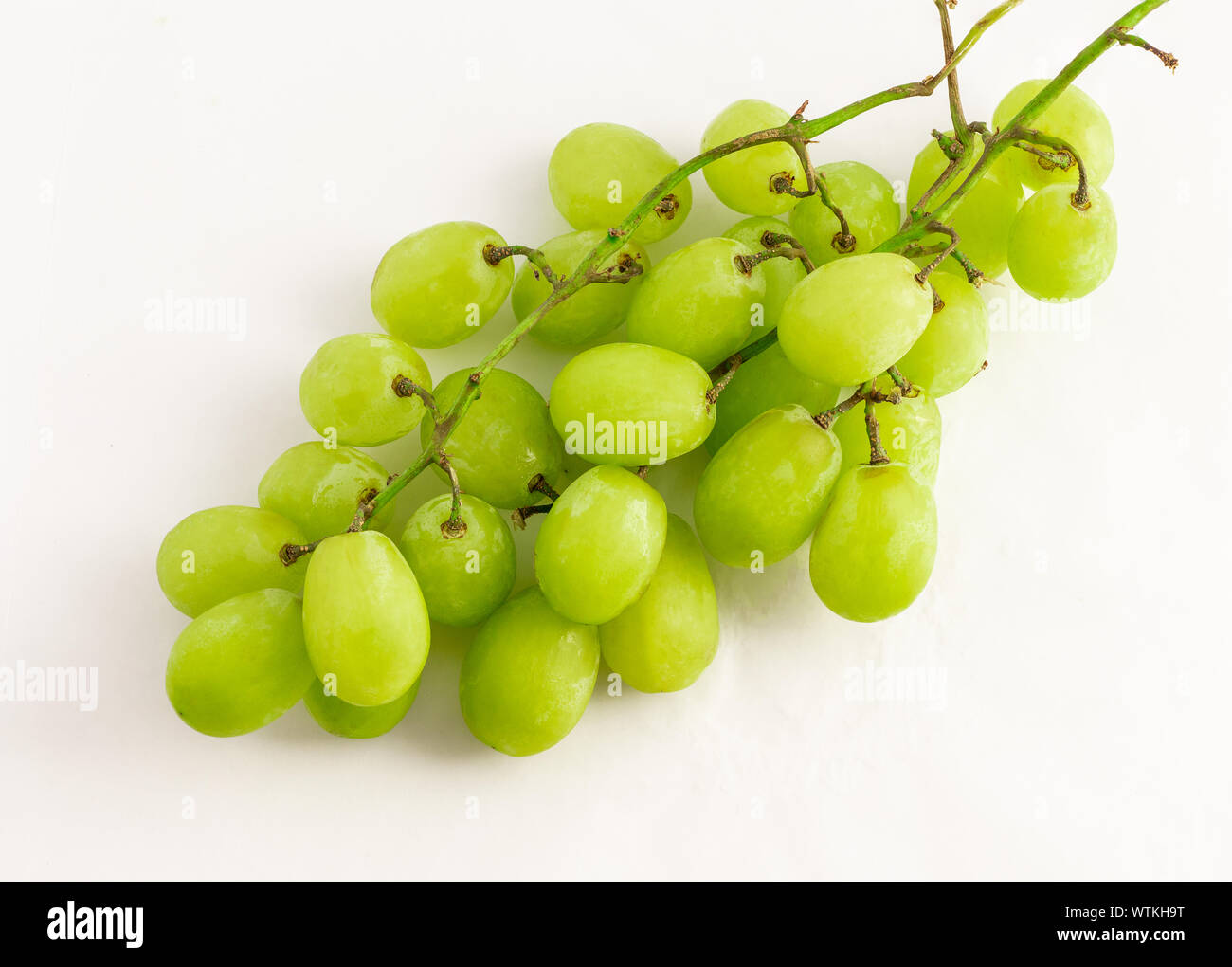 green grapes on white background Stock Photo Alamy