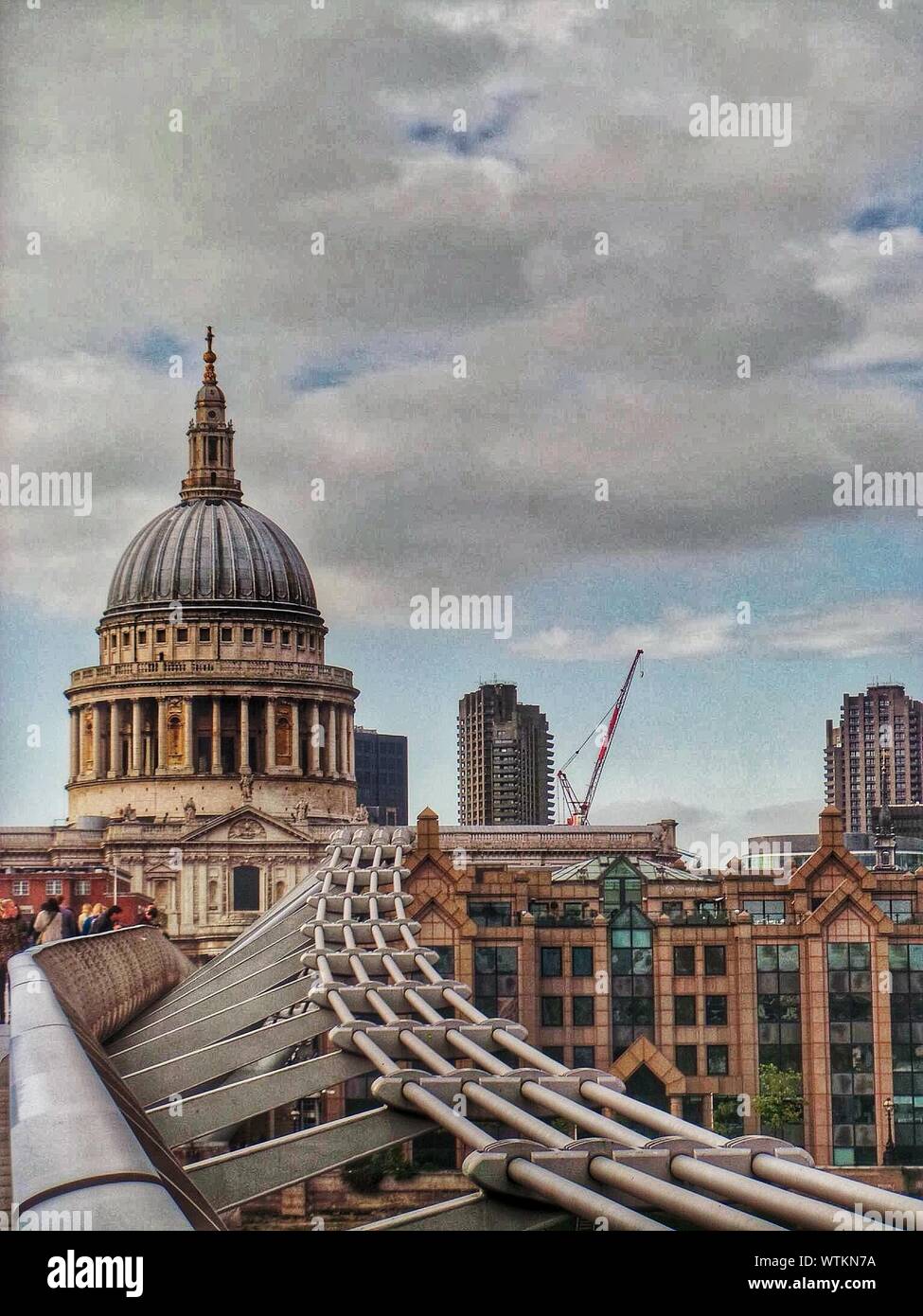 Dome Of St Pauls Cathedral Against Cloudy Sky Stock Photo