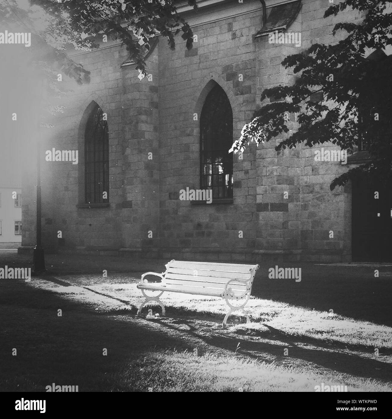 Bench In Front Of A Church Wall Stock Photo 273342313 Alamy