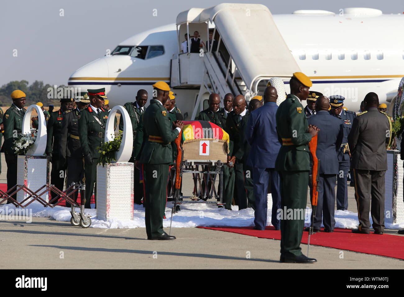 Harare, Zimbabwe. 11th Sep, 2019. The body of the late former Zimbabwean President Robert Mugabe arrives at the Robert Gabriel Mugabe International Airport in Harare, Zimbabwe, on Sept. 11, 2019. The body of the late former Zimbabwean President Robert Mugabe, who died in Singapore last Friday aged 95, arrived in the country on Wednesday afternoon ahead of his burial planned for Sunday. Credit: Chen Yaqin/Xinhua/Alamy Live News Stock Photo