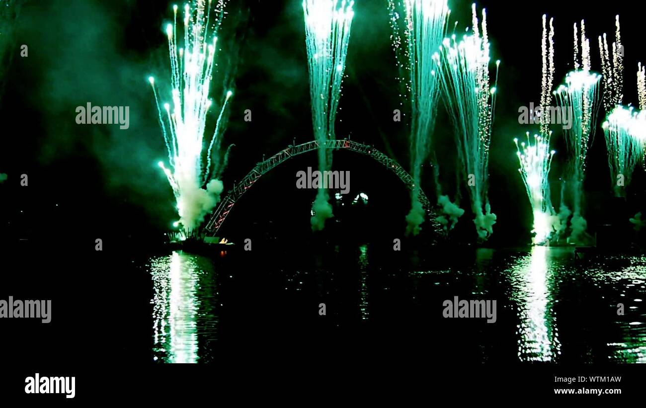 Sky Illumed With Fire Crackers At Night Stock Photo