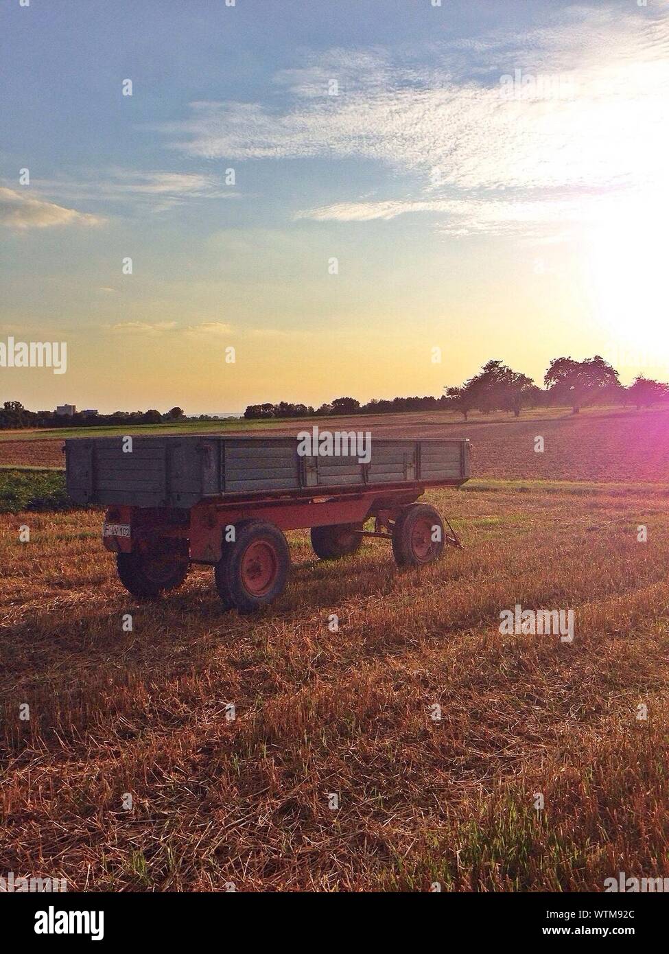 Side View Of Vehicle On Agricultural Land Stock Photo