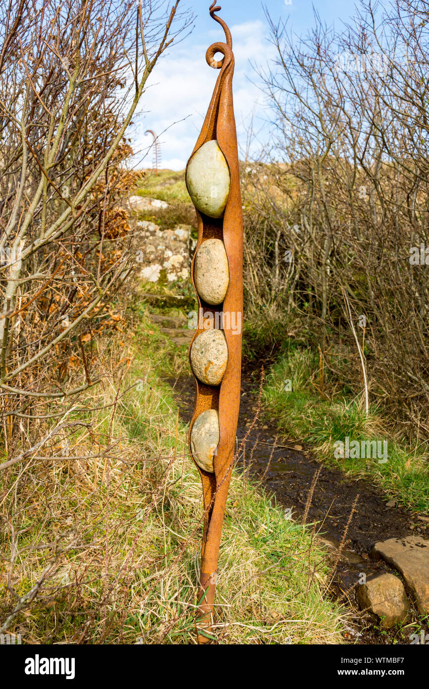 Metal 'peas in a pod' sculpture on the Calgary Sculpture Walk, Calgary Bay, Isle of Mull, Scotland, UK Stock Photo