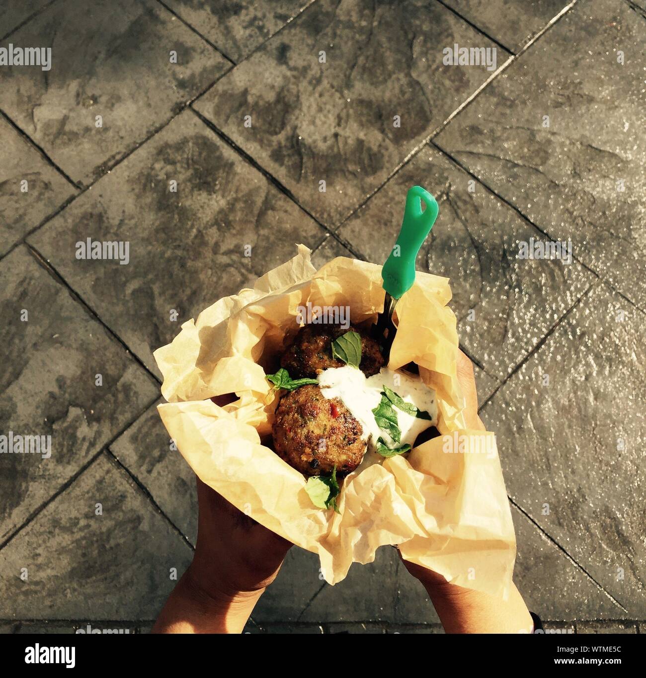 Holding kebab hi-res stock photography and images - Alamy
