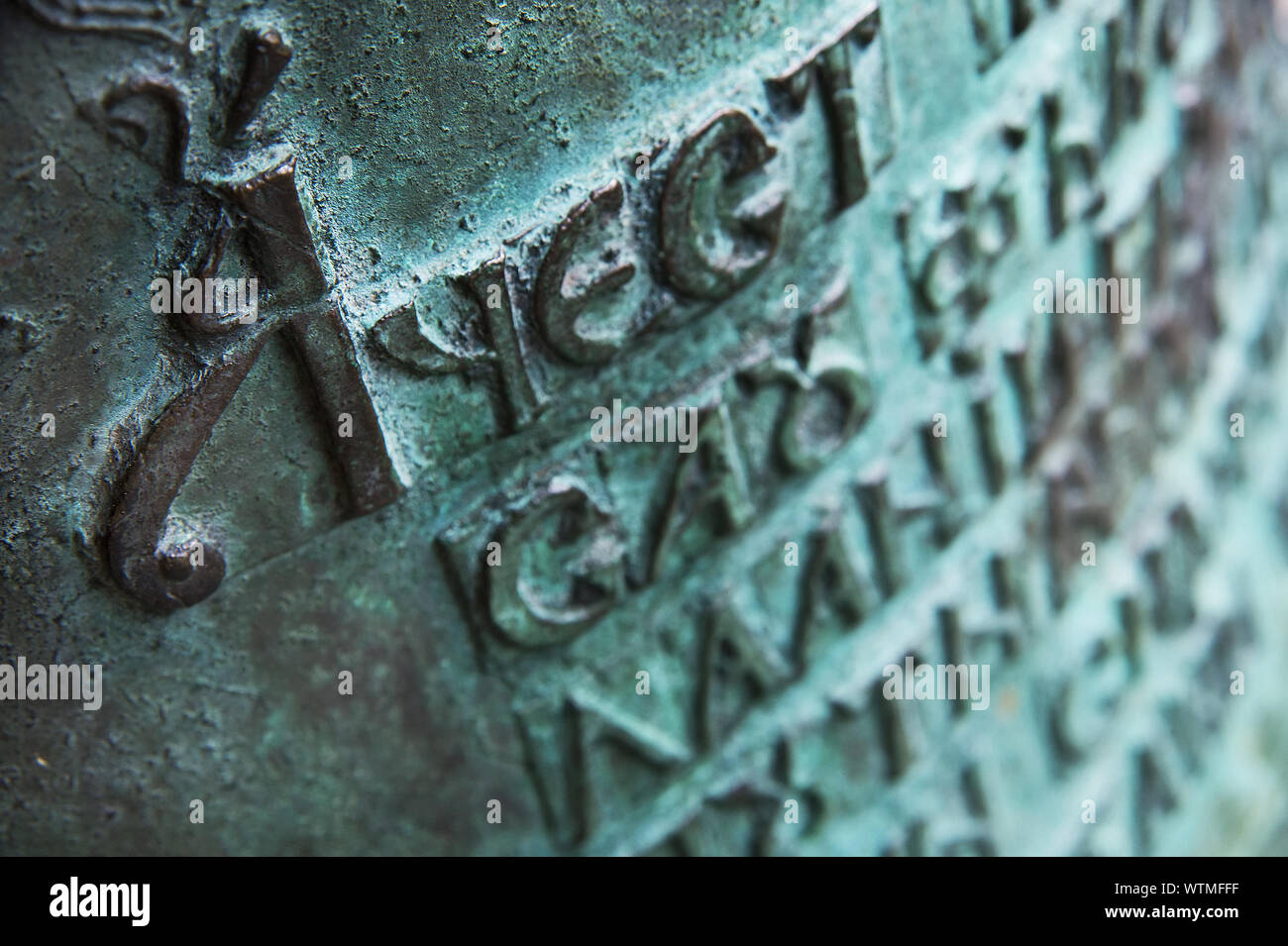 Close-up Of Text Engrave On Wall Stock Photo