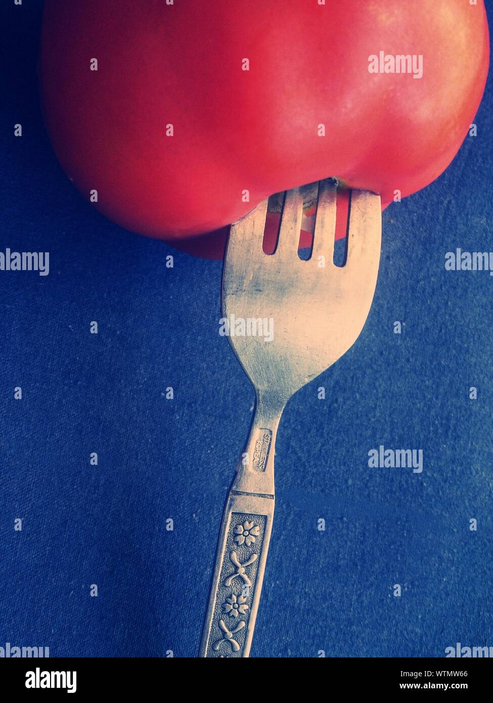 Tomato and a fork hires stock photography and images Alamy