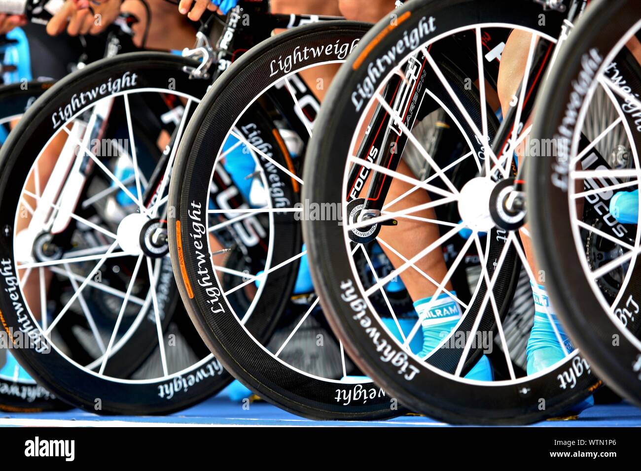 Lightweight brand wheels at the start of a team time trial Stock Photo