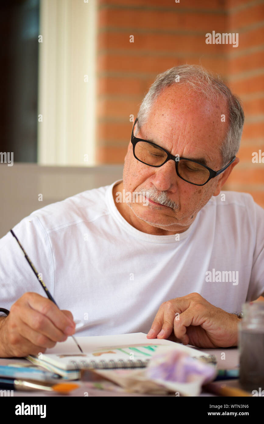 Elderly Man Painting High Resolution Stock Photography and Images - Alamy