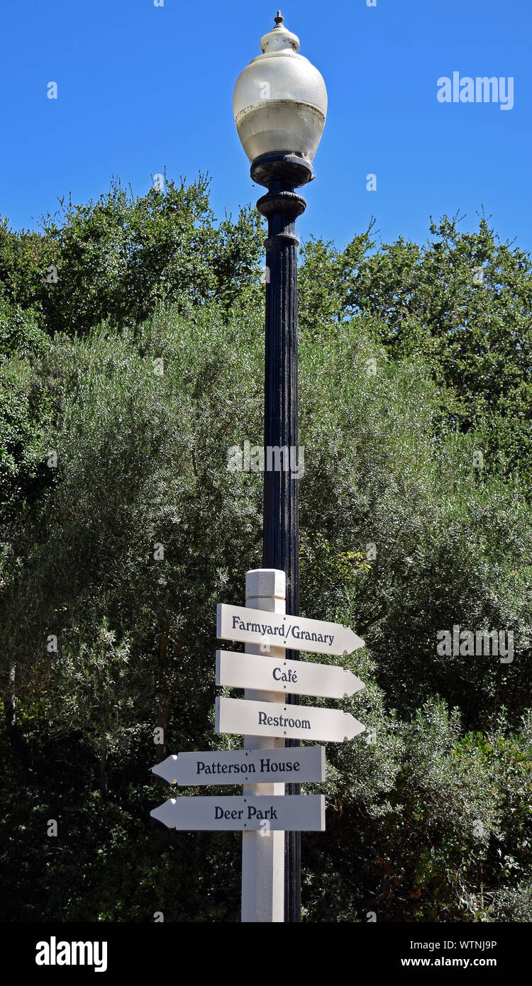 lamppost with direction arrows at  Ardenwood Historic Farm, Fremont, California Stock Photo