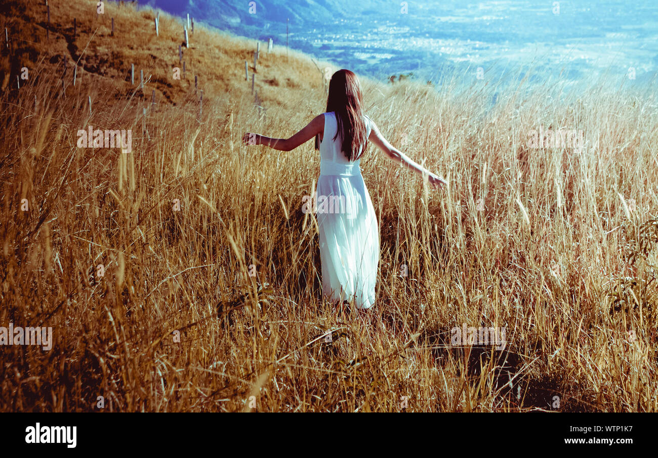Woman in white rear view hi-res stock photography and images - Alamy