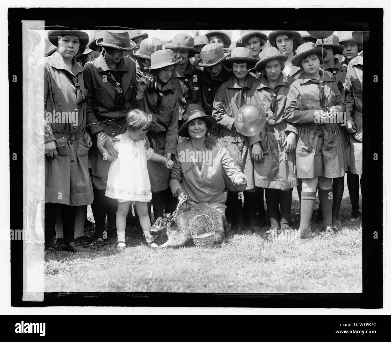 Mrs. Coolidge & raccoon [Rebecca], Easter egg rolling, 1927 Stock Photo