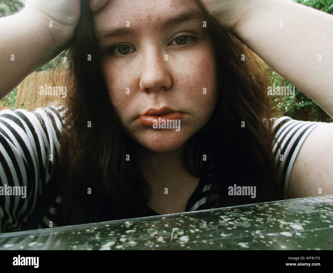 Woman head in hands sad hi-res stock photography and images - Alamy