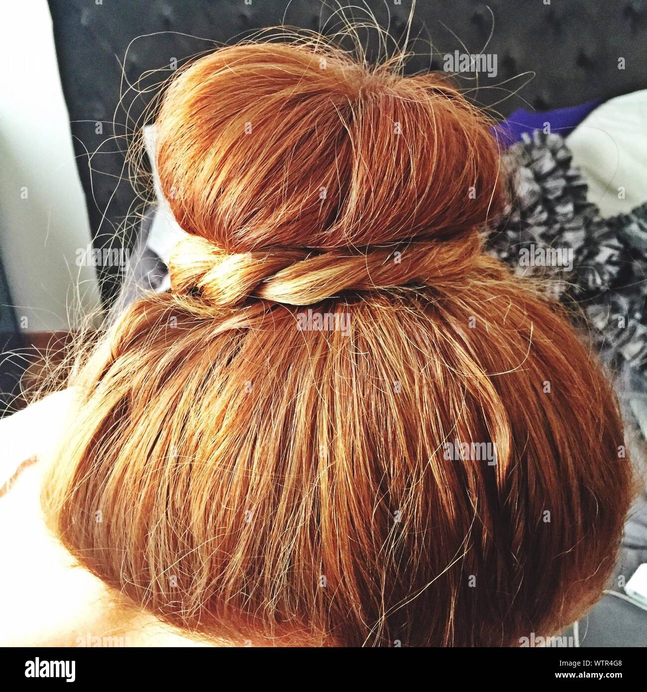 Cropped Image Of Blond Haired Bun Stock Photo
