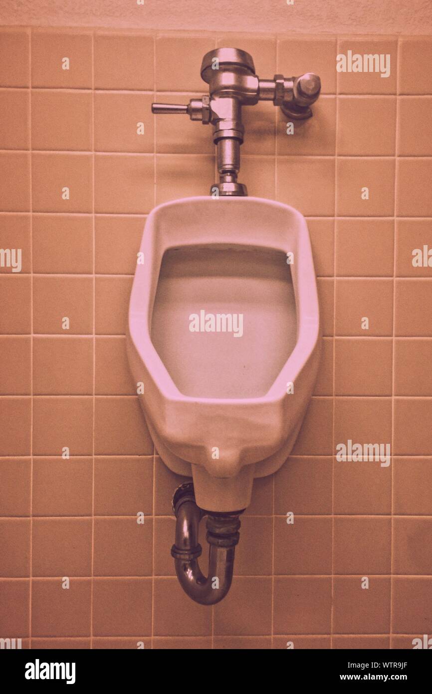 Metal urinal hi-res stock photography and images - Alamy