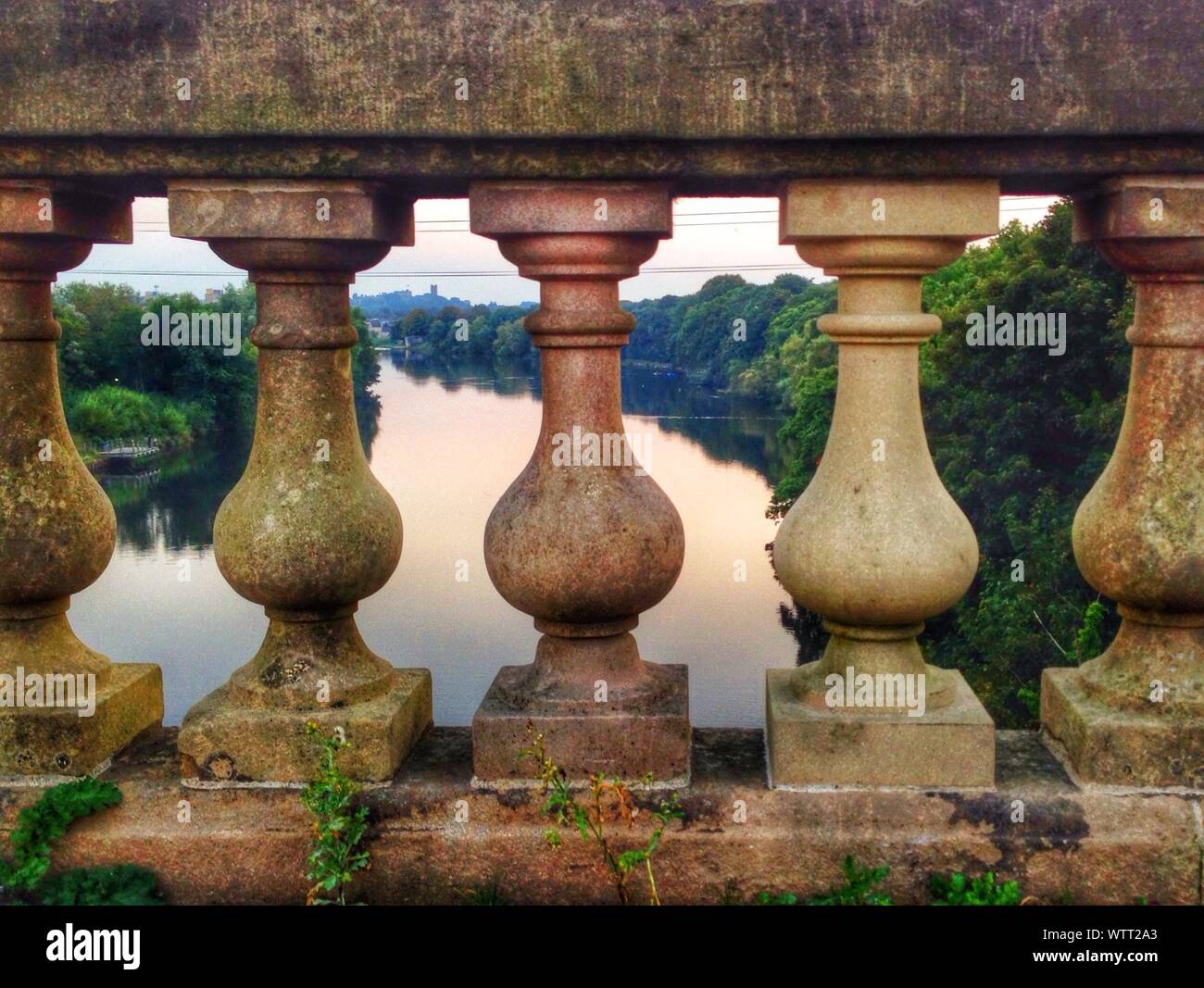 Stone Balustrade With River On Background Stock Photo