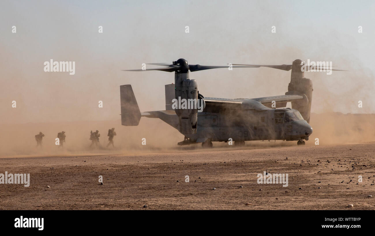 U.S Marines with 1st Battalion, 7th Marine Regiment, attached to Special Purpose Marine Air-Ground Task Force-Crisis Response-Central Command, run during a Tactical Recovery Aircraft and Personnel Exercise (TRAPEX) in Kuwait, Sept. 8, 2019. The SPMAGTF-CR-CC is a quick reaction force, prepared to deploy a variety of capabilities across the region. (U.S. Marine Corps photo by Sgt. Robert G. Gavaldon) Stock Photo