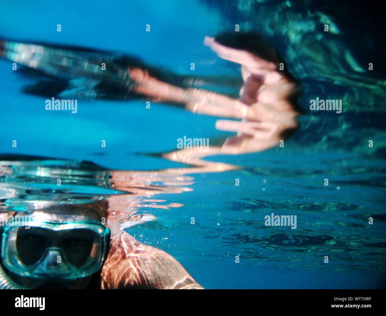 Underwater View Of Person Snorkelling Stock Photo